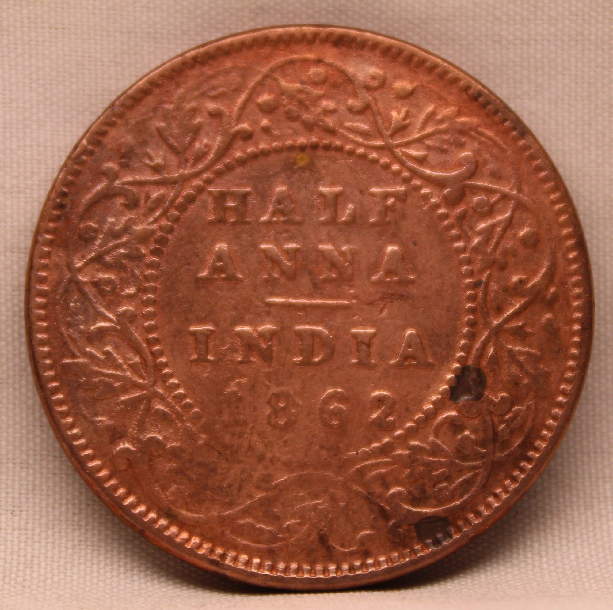 1/2 Anna  Coin of Victoria Queen of Calcutta Mint of 1862 Copper