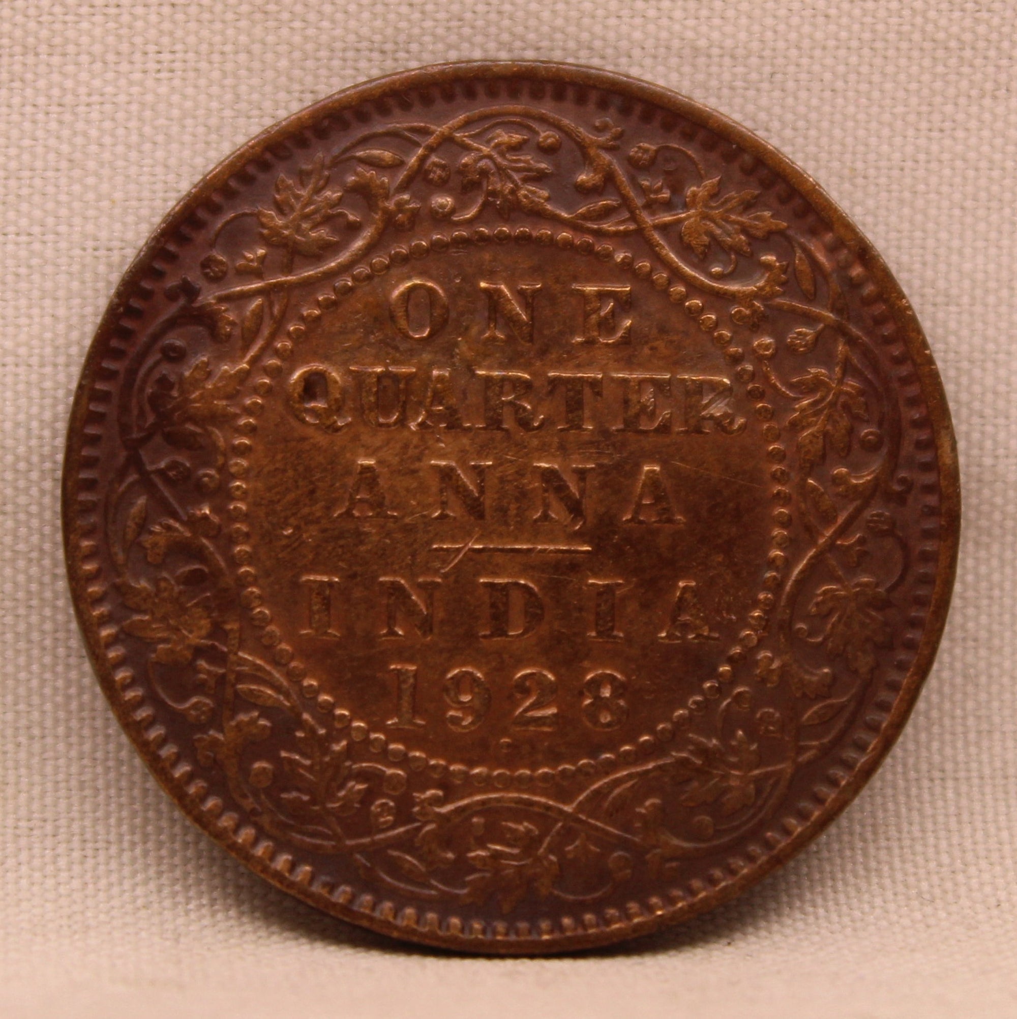 1/4 Anna Coin of King George V of Calcutta Mint of 1928 Bronze